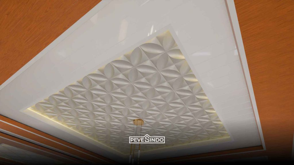 Model plafon PVC ruang tamu mewah dengan teknik drop ceiling bertingkat untuk menciptakan dimensi ruangan yang lebih luas.