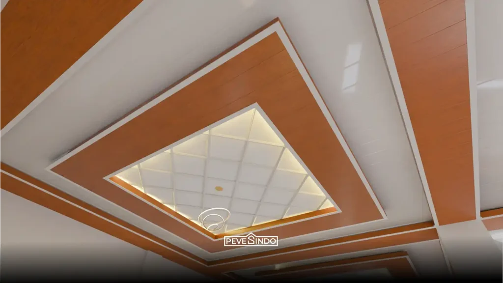 Foto plafon pvc bermotif ukiran klasik warna putih gading.